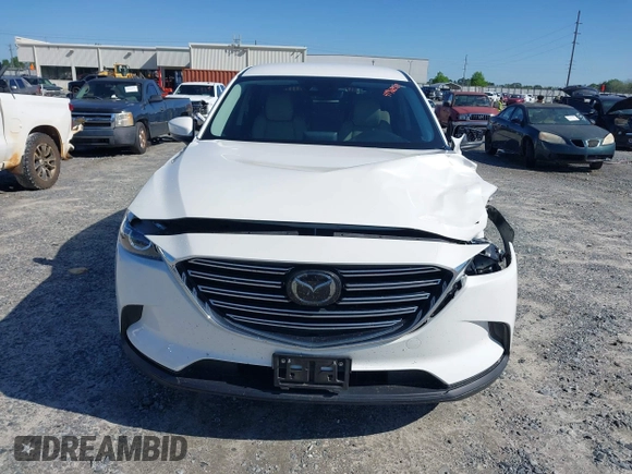 2019 Mazda CX-9 Touring z VIN JM3TCACY3K0333931, wystawiony jako IAAI lot #41968519 z przebiegiem 102 992 mil mil oraz . Historia ofert i sprzedaży dostępna na DreamBid. Obrazek 12.