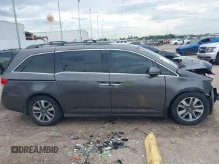 2015 Honda Odyssey Touring Elite with VIN 5FNRL5H99FB089642, listed as a IAAI auction lot 42591786 with 100,755 mi miles and . Bid and sale history available at DreamBid. Image 14.