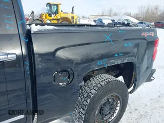 2015 Chevrolet Silverado 1500 High Country with VIN 3GCUKTEC0FG148198, listed as a IAAI auction lot 41493933 with 164,453 mi miles and . Bid and sale history available at DreamBid. Image 18.
