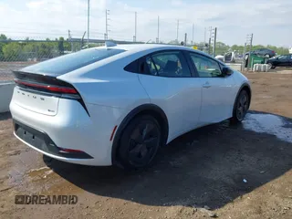 2023 Toyota Prius LE z VIN JTDACAAU7P3009676, wystawiony jako IAAI lot #42186462 z przebiegiem 31 567 mil mil oraz . Historia ofert i sprzedaży dostępna na DreamBid. Obrazek 4.