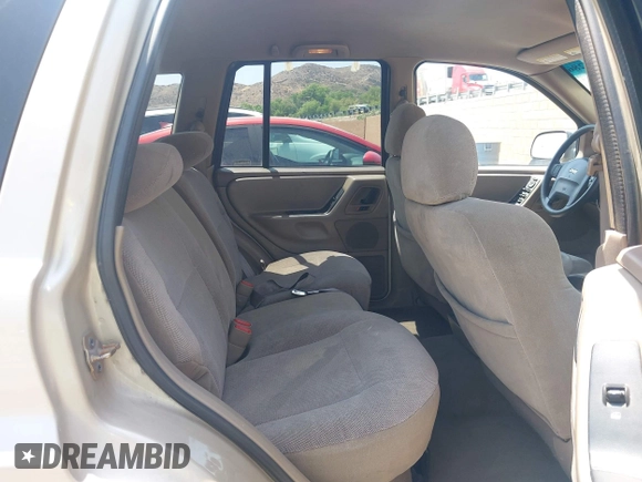2001 Jeep Grand Cherokee Laredo with VIN 1J4GX48S01C606559, listed as a IAAI auction lot 42384286 with 149,146 mi miles and . Bid and sale history available at DreamBid. Image 8.