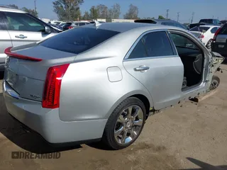 2014 Cadillac ATS Standard RWD with VIN 1G6AA5RXXE0110031, listed as a IAAI auction lot 42100955 with 82,109 mi miles. Bid and sale history available at carsss.com. Image 4.