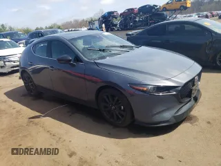 2021 Mazda 3 Premium Plus z VIN JM1BPBNY7M1311309, wystawiony jako Copart lot #54044315 z przebiegiem 59 642 mil mil oraz Szkoda całkowita • Salvage title. Historia ofert i sprzedaży dostępna na DreamBid. Obrazek 4.