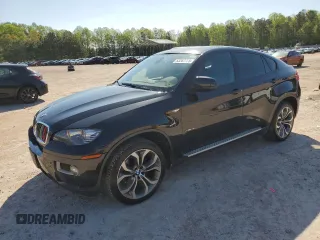 2014 BMW X6 xDrive35i z VIN 5UXFG2C56E0H10599, wystawiony jako Copart lot #53267755 z przebiegiem 146 281 mil mil oraz Czysty tytuł • Clean title. Historia ofert i sprzedaży dostępna na DreamBid. Obrazek 1.