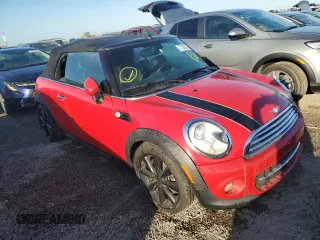 2014 MINI Convertible with VIN WMWZN3C5XET266498, listed as a Copart auction lot 77763074 with 76,680 mi miles and Non repairable. Bid and sale history available at DreamBid. Image 4.