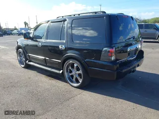 2005 Ford Expedition Eddie Bauer with VIN 1FMPU17505LA25797, listed as a IAAI auction lot 41860548 with 130,044 mi miles. Bid and sale history available at carsss.com. Image 3.