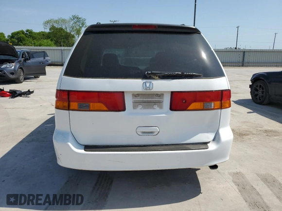 2004 Honda Odyssey EX-L with VIN 5FNRL18974B092979, listed as a Copart auction lot 52429055 with 106,515 mi miles and Clean Title. Bid and sale history available at DreamBid. Image 6.