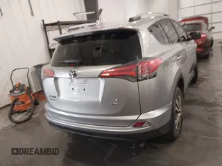 2016 Toyota RAV4 LE with VIN 2T3BFREV7GW450556, listed as a IAAI auction lot 41815720 with 106,734 mi miles. Bid and sale history available at carsss.com. Image 17.