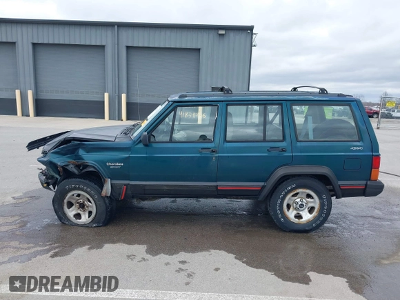1996 Jeep Cherokee Sport with VIN 1J4FJ68S5TL235507, listed as a IAAI auction lot 41834736 with 174,634 mi miles. Bid and sale history available at carsss.com. Image 14.