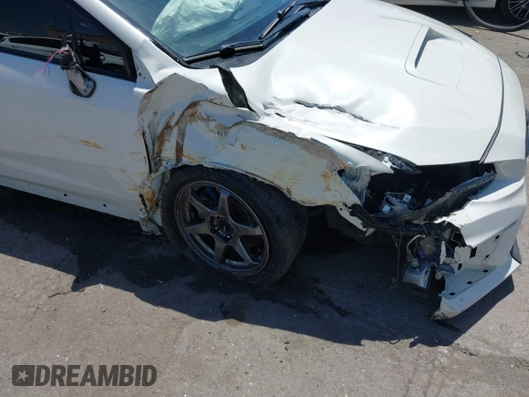2021 Subaru WRX z VIN JF1VA1A68M9801794, wystawiony jako IAAI lot #42421444 z przebiegiem 100 920 mil mil oraz . Historia ofert i sprzedaży dostępna na DreamBid. Obrazek 6.