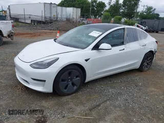 2023 Tesla Model 3 z VIN 5YJ3E1EA1PF545223, wystawiony jako IAAI lot #41591588 z przebiegiem 26 523 mil mil oraz . Historia ofert i sprzedaży dostępna na DreamBid. Obrazek 2.