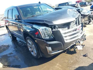 2019 Cadillac Escalade Premium Luxury with VIN 1GYS4CKJ1KR407662, listed as a IAAI auction lot 41519495 with 101,892 mi miles. Bid and sale history available at carsss.com. Image 1.