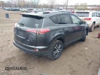 2017 Toyota RAV4 LE with VIN JTMBFREV3HJ704411, listed as a IAAI auction lot 40868831 with 102,729 mi miles. Bid and sale history available at carsss.com. Image 4.