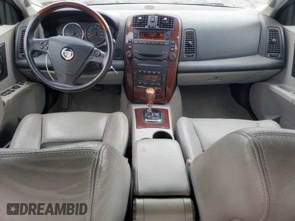 2006 Cadillac CTS with VIN 1G6DP577X60147354, listed as a Copart auction lot 73863824 with 76,606 mi miles and Salvage Title. Bid and sale history available at carsss.com. Image 8.