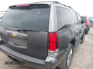 2014 Chevrolet Tahoe LT with VIN 1GNSCBE08ER106419, listed as a IAAI auction lot 41789896 with 99,420 mi miles and . Bid and sale history available at DreamBid. Image 4.