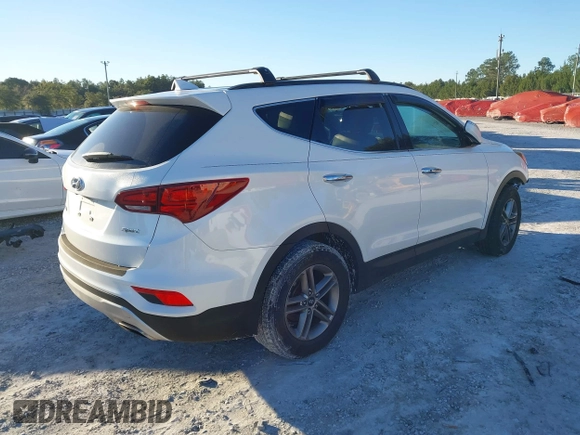 2017 Hyundai Santa Fe 2.4L z VIN 5XYZU3LB4HG435992, wystawiony jako IAAI lot #40927607 z przebiegiem 104 868 mil mil oraz . Historia ofert i sprzedaży dostępna na DreamBid. Obrazek 4.
