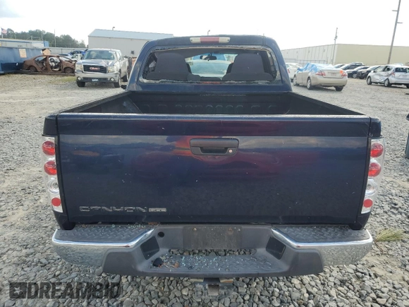 2007 GMC Canyon SLE1 with VIN 1GTCS139978239016, listed as a Copart auction lot 74303524 with 136,579 mi miles and Salvage Title. Bid and sale history available at carsss.com. Image 6.