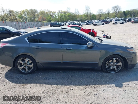 2009 Acura TL Technology z VIN 19UUA96579A005856, wystawiony jako IAAI lot #42117231 z przebiegiem 180 503 mil mil oraz . Historia ofert i sprzedaży dostępna na DreamBid. Obrazek 12.