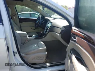 2013 Cadillac SRX Luxury Collection with VIN 3GYFNCE33DS608040, listed as a IAAI auction lot 41912860 with 128,295 mi miles and . Bid and sale history available at DreamBid. Image 5.