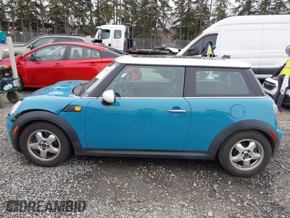 2009 MINI Cooper Hardtop with VIN WMWMF33569TW70413, listed as a IAAI auction lot 41776589 with 85,394 mi miles. Bid and sale history available at carsss.com. Image 14.