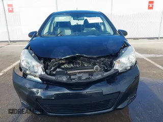 2014 Toyota Yaris L with VIN JTDKTUD36ED586456, listed as a IAAI auction lot 41888730 with 92,742 mi miles. Bid and sale history available at carsss.com. Image 12.