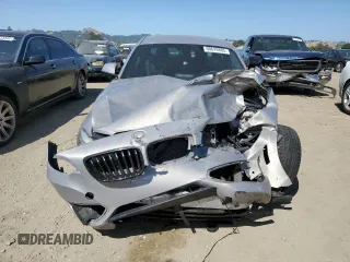 2016 BMW 2 Series 228i with VIN WBA1F9C53GV545568, listed as a Copart auction lot 60629805 with 67,530 mi miles and Salvage title. Bid and sale history available at DreamBid. Image 5.