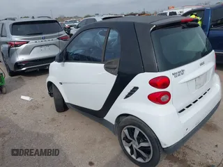2010 Smart fortwo Pure with VIN WMEEJ3BA5AK390904, listed as a IAAI auction lot 41688922 with Not provided miles and . Bid and sale history available at DreamBid. Image 3.