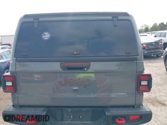 2021 Jeep Gladiator Rubicon with VIN 1C6JJTBG8ML619972, listed as a IAAI auction lot 42057805 with 37,875 mi miles and . Bid and sale history available at DreamBid. Image 17.