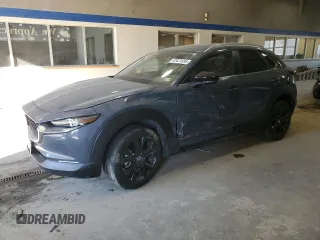 2022 Mazda CX-30 2.5 S Carbon Edition with VIN 3MVDMBCL7NM429131, listed as a Copart auction lot 42421695 with 21,825 mi miles and Salvage Title. Bid and sale history available at carsss.com. Image 1.