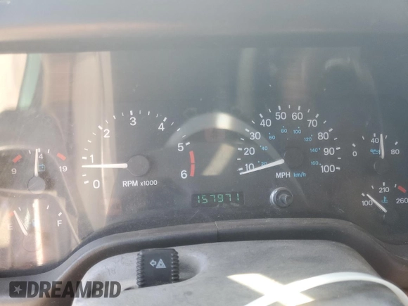 1999 Jeep Wrangler Sahara with VIN 1J4FY49S6XP478675, listed as a Copart auction lot 52147605 with 157,971 mi miles and Salvage Title. Bid and sale history available at carsss.com. Image 9.