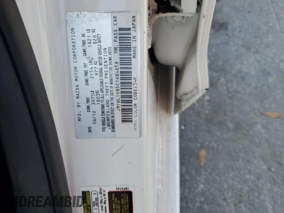 2012 Mazda 3 i Touring with VIN JM1BL1V85C1684658, listed as a Copart auction lot 43464185 with 110,013 mi miles and Salvage Title. Bid and sale history available at DreamBid. Image 13.
