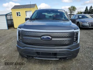 2023 Ford F-150 Lightning Pro z VIN 1FT6W1EV4PWG42053, wystawiony jako Copart lot #50003045 z przebiegiem 29 320 mil mil oraz Szkody całkowita. Historia ofert i sprzedaży dostępna na DreamBid. Obrazek 5.