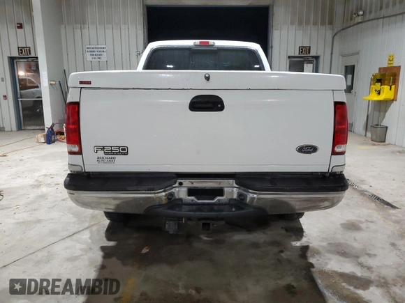 2003 Ford Super Duty F-250 XL with VIN 1FTNX21L83EA33406, listed as a Copart auction lot 84968604 with 204,058 mi miles and Salvage Title. Bid and sale history available at carsss.com. Image 6.