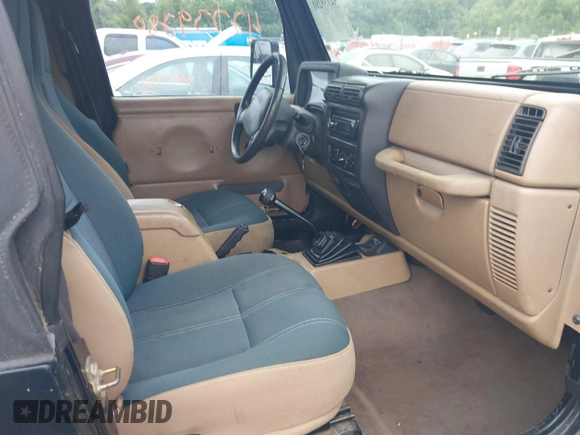 2001 Jeep Wrangler Sahara with VIN 1J4FA59S41P376079, listed as a IAAI auction lot 42739280 with 255,999 mi miles and . Bid and sale history available at DreamBid. Image 5.
