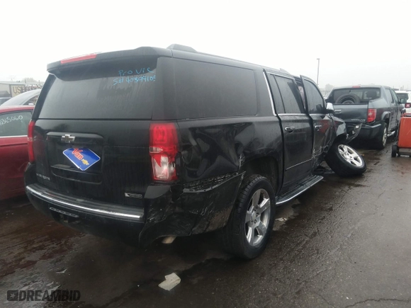 2017 Chevrolet Suburban Premier with VIN 1GNSCJKCXHR312158, listed as a IAAI auction lot 40399105 with 150,560 mi miles. Bid and sale history available at carsss.com. Image 4.