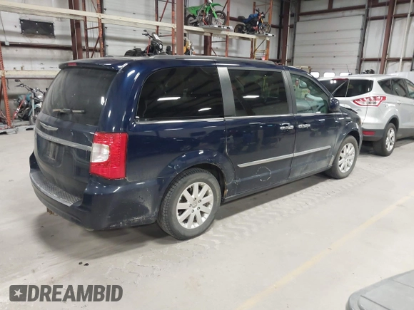 2016 Chrysler Town & Country Touring with VIN 2C4RC1BG2GR305711, listed as a IAAI auction lot 41984947 with 206,360 mi miles. Bid and sale history available at carsss.com. Image 4.