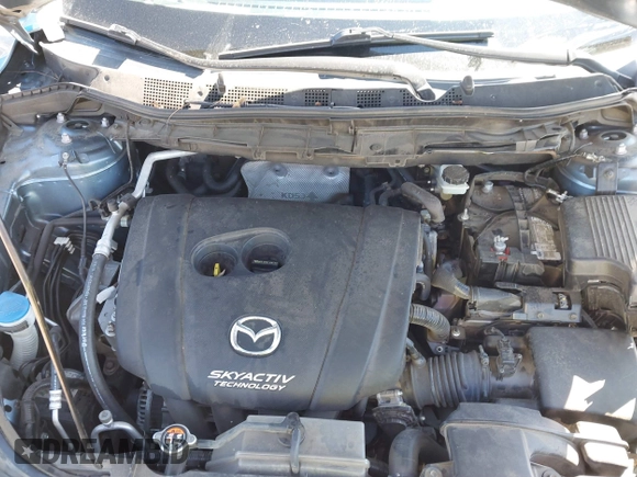 2016 Mazda CX-5 Grand Touring with VIN JM3KE2DY2G0715272, listed as a IAAI auction lot 41590492 with 134,176 mi miles. Bid and sale history available at carsss.com. Image 10.