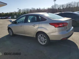 2018 Ford Focus SE with VIN 1FADP3F23JL219189, listed as a Copart auction lot 52209335 with 101,180 mi miles and Salvage title. Bid and sale history available at DreamBid. Image 2.