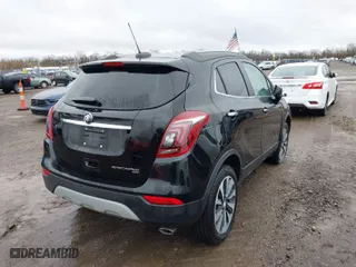 2021 Buick Encore Preferred with VIN KL4CJESB5MB300742, listed as a IAAI auction lot 41009716 with 13,964 mi miles. Bid and sale history available at carsss.com. Image 4.