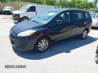 2012 Mazda 5 Sport with VIN JM1CW2BLXC0128507, listed as a IAAI auction lot 42145486 with 175,494 mi miles. Bid and sale history available at carsss.com. Image 2.