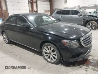 2017 Mercedes-Benz E-Class E 300 Luxury with VIN WDDZF4KB2HA133513, listed as a IAAI auction lot 41679730 with 136,136 mi miles. Bid and sale history available at carsss.com. Image 1.