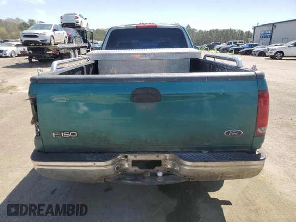 1998 Ford F-150 z VIN 1FTZF176XWNB03959, wystawiony jako Copart lot #49043105 z przebiegiem 300 884 mil mil oraz Szkoda całkowita • Salvage title. Historia ofert i sprzedaży dostępna na DreamBid. Obrazek 6.