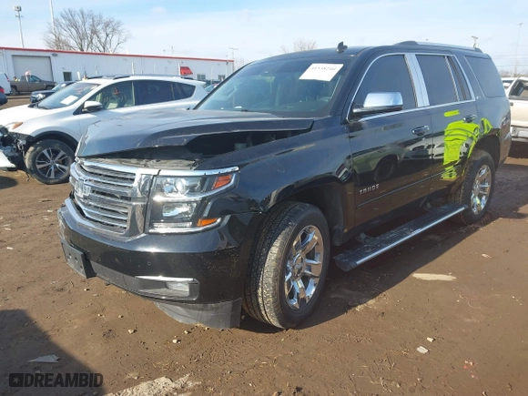 2015 Chevrolet Tahoe LTZ with VIN 1GNSKCKC5FR115779, listed as a IAAI auction lot 41538240 with 155,271 mi miles. Bid and sale history available at carsss.com. Image 19.