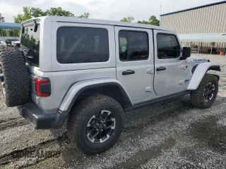 2024 Jeep Wrangler Rubicon with VIN 1C4RJXR6XRW292478, listed as a Copart auction lot 55655575 with 11,122 mi miles and Salvage Title. Bid and sale history available at carsss.com. Image 4.
