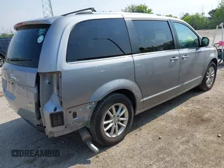 2018 Dodge Grand Caravan SXT z VIN 2C4RDGCG6JR249732, wystawiony jako IAAI lot #42452222 z przebiegiem 85 190 mil mil oraz . Historia ofert i sprzedaży dostępna na DreamBid. Obrazek 4.