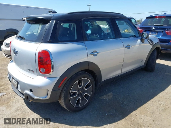 2012 MINI Countryman S with VIN WMWZC5C59CWL60076, listed as a IAAI auction lot 42078926 with 60,280 mi miles and . Bid and sale history available at DreamBid. Image 4.