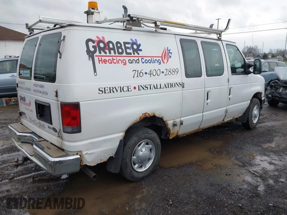 2011 Ford Econoline Cargo Commercial with VIN 1FTNE1EW1BDA17492, listed as a IAAI auction lot 41036647 with 242,810 mi miles and . Bid and sale history available at DreamBid. Image 4.