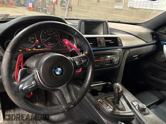 2014 BMW 4 Series 428i xDrive with VIN WBA3N5C56EF716258, listed as a Copart auction lot 52916185 with 106,512 mi miles and Salvage Title. Bid and sale history available at DreamBid. Image 9.