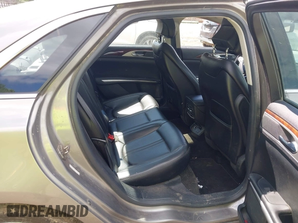 2016 Lincoln MKZ Hybrid with VIN 3LN6L2LU4GR630976, listed as a IAAI auction lot 42160730 with 244,723 mi miles and . Bid and sale history available at DreamBid. Image 8.