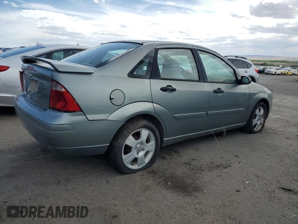 2005 Ford Focus S with VIN 1FAFP34N35W235922, listed as a Copart auction lot 54729854 with Not Provided miles and Salvage Title. Bid and sale history available at carsss.com. Image 3.